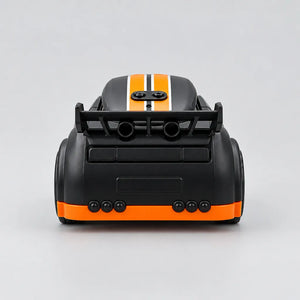 White mini RC drift car with orange and blue stripes, twin-stick controller and packaging