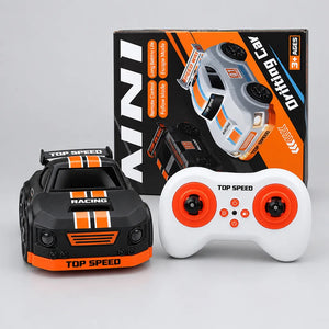 Side view of white mini RC drift car with number 01, black wheels and rear spoiler