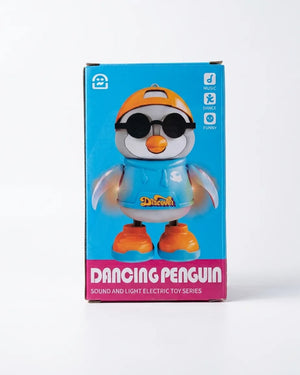 Dancing penguin toy in retail box with blue outfit, orange shoes, and round goggles