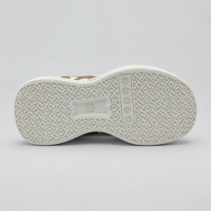 Pink No.1 light-up kids sneaker with white sole, inner side view