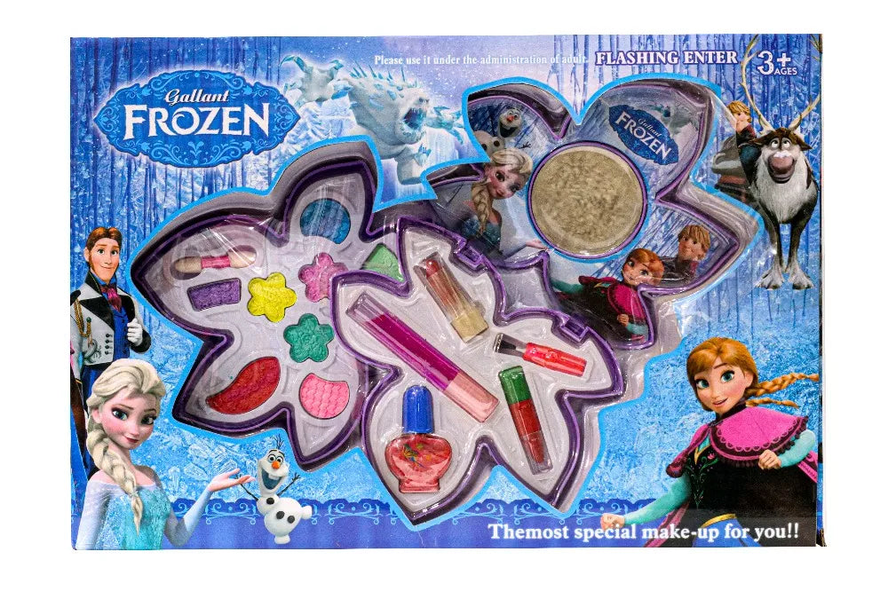 Kids makeup playset box showing heart-shaped purple compact with colored cosmetics and accessories