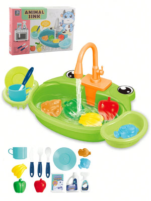 Green kids animal sink play set with orange faucet and toy food pieces