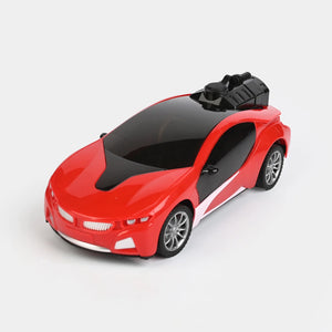 Red RC spray drift car with black hood, close-up front angle