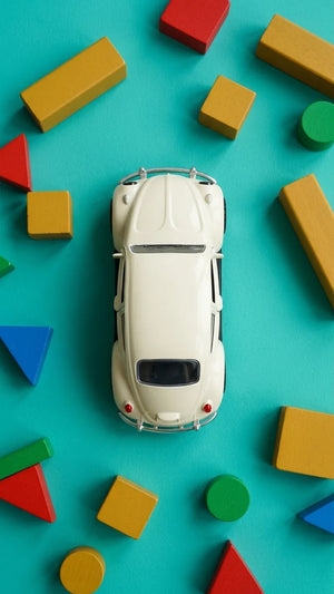 Beige Volkswagen Beetle diecast model car, top view