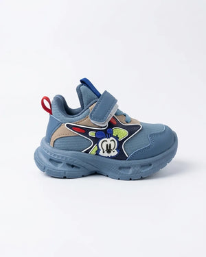Grey kids cartoon chunky sneakers with orange pull tabs worn on feet