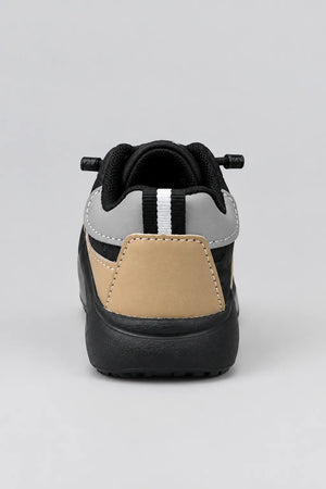 Black Trail kids sneaker with tan and grey contrast panels, outer side view