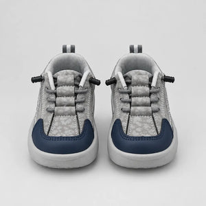 Front view of grey-toned Trail kids sneakers listed as Beige, with navy toe panels