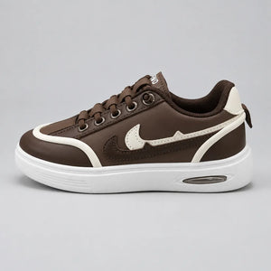 Brown DuoTrim kids sneaker with white contrast detailing and chunky white sole