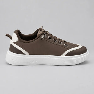 White textured outsole of DuoTrim kids sneaker with zigzag tread and circular patterns