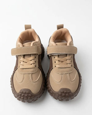 Pair of Cruise beige and brown kids chunky sneakers shown from the front