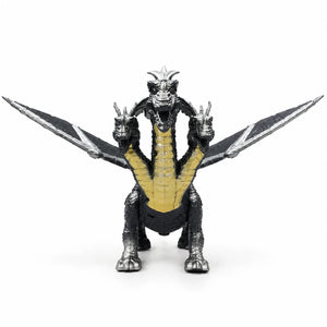 Front view of a silver and black three-headed dragon toy with spread wings and yellow chest