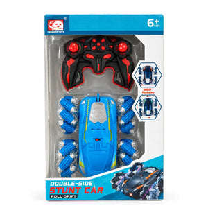 Blue double-sided RC stunt car with black and red remote in packaging marked ages 6+