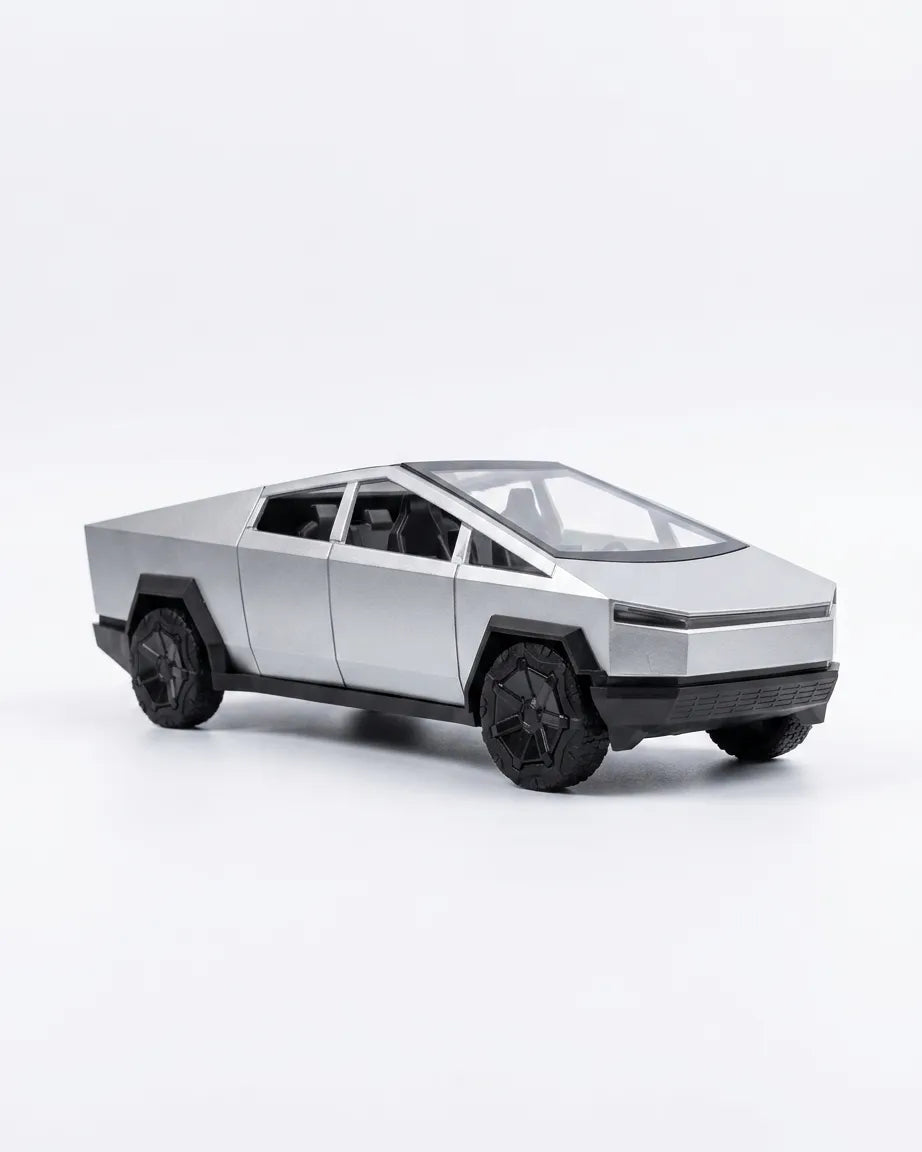 White remote-control Cybertruck-style toy car with black wheels and angular body