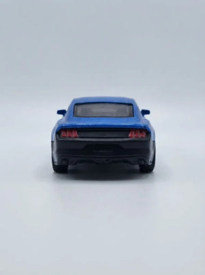 Blue die-cast pull-back car, rear view with dark bumper and taillights