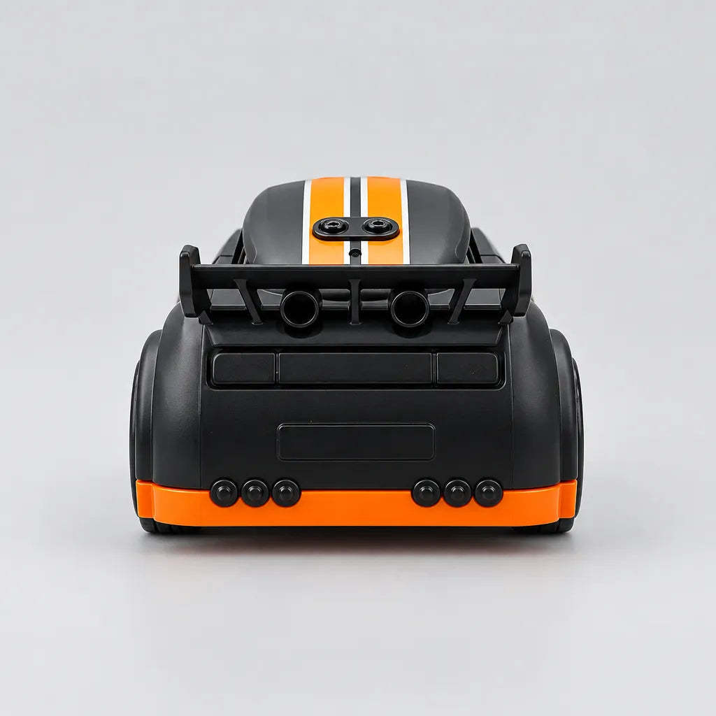 White mini RC drift car with orange and blue stripes, twin-stick controller and packaging