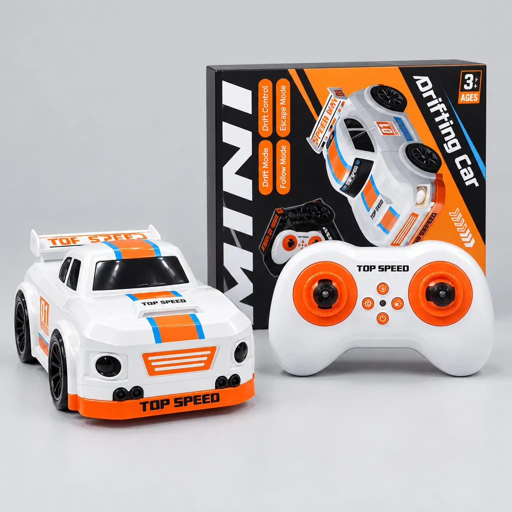 Rear view of white mini RC drift car with white spoiler and orange bumper