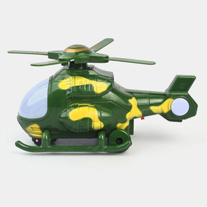 Green attack helicopter toy with glowing cockpit window and side missile pod details