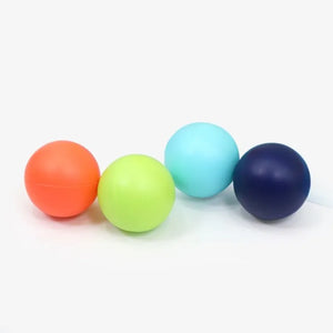 Set of four colorful pounding balls: orange, green, light blue, and dark blue.