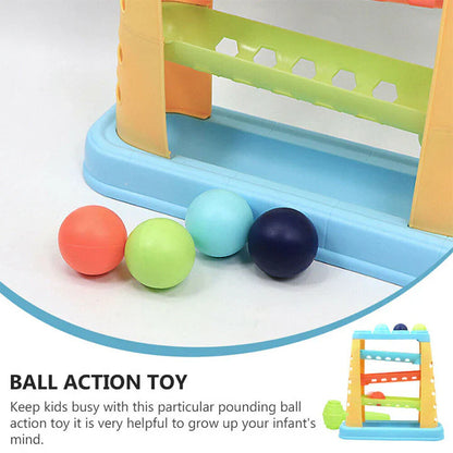 Pounding balls (orange, green, light blue, dark blue) beside a blue ball tray.