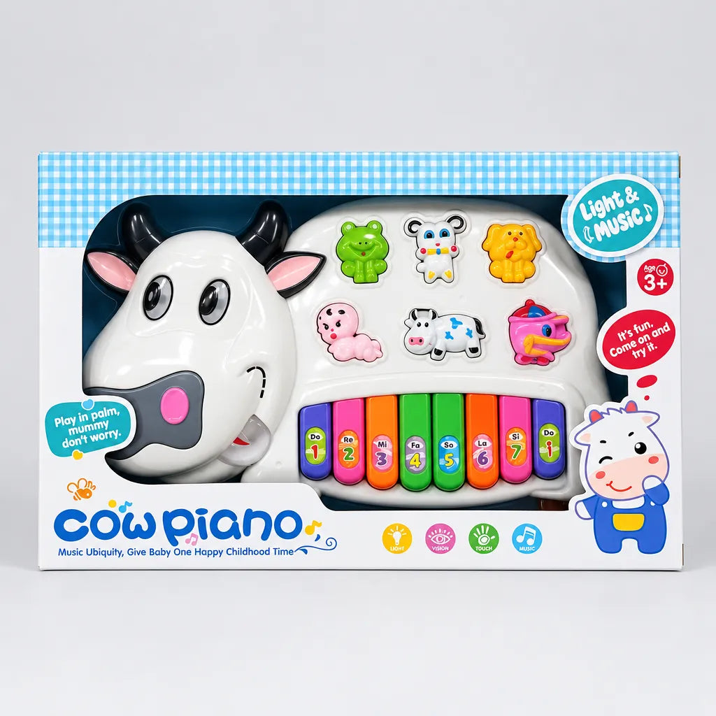 Farfhe Cow Piano toy in retail box showing eight colourful keys and age 3+ label