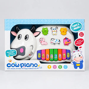 Farfhe Cow Piano toy in retail box showing eight colourful keys and age 3+ label