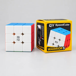 QiYi Warrior S 3x3 stickerless cube with white, blue and red faces beside its branded box