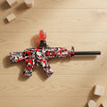 Red and black camo electric water gel blaster toy gun with gel bead nozzle