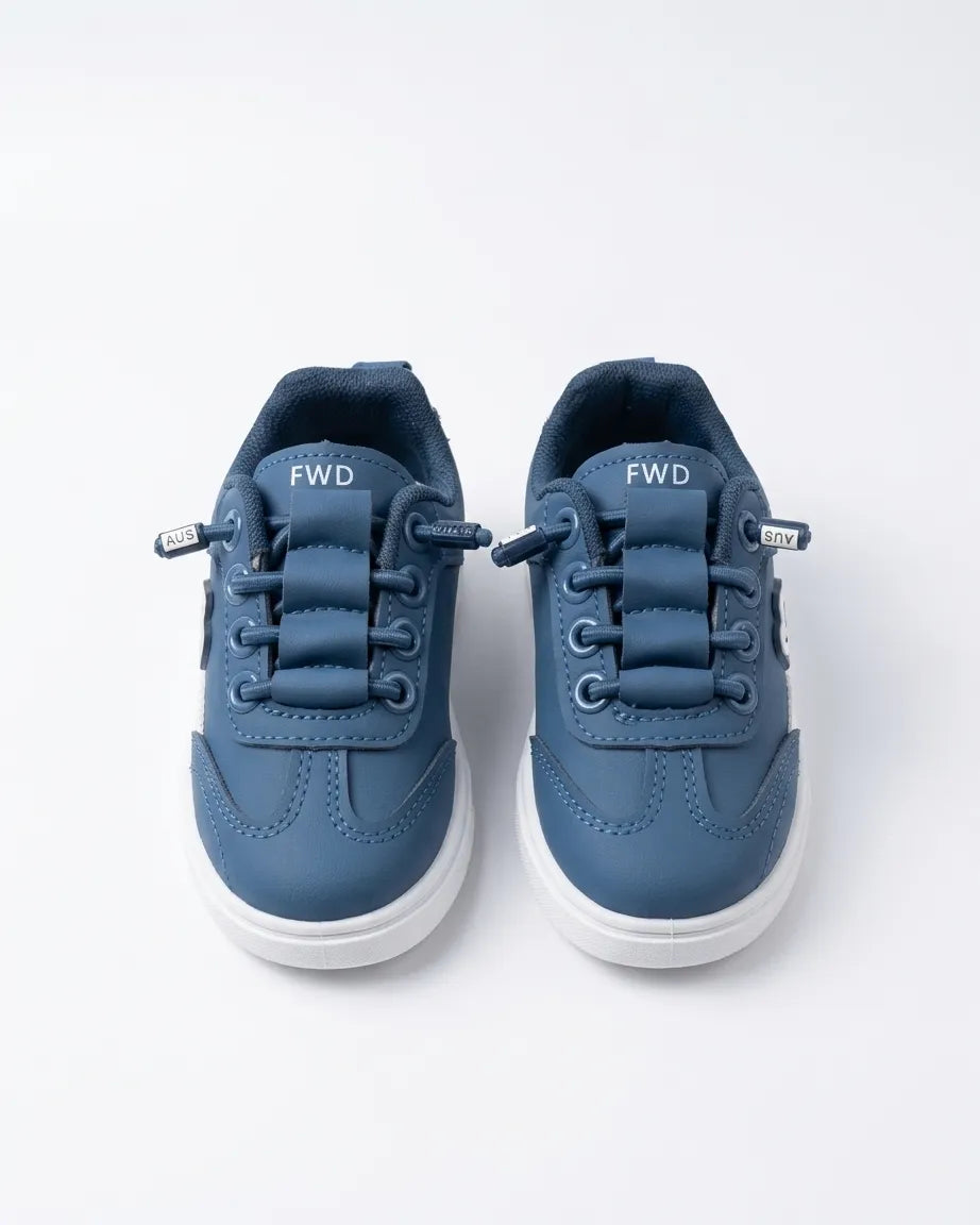 Blue Alo kids sneaker side profile with white contrast panel and raised alo lettering