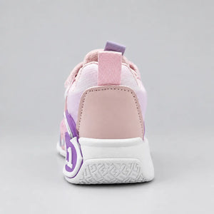 Pink No.1 chunky kids sneaker with strap and purple sole detail, side view