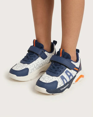 Top view of navy and white kids sneakers with straps and navy laces