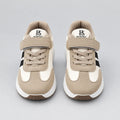 Front view of a pair of PrimeBee kids sneakers with black stripes and hook-and-loop strap