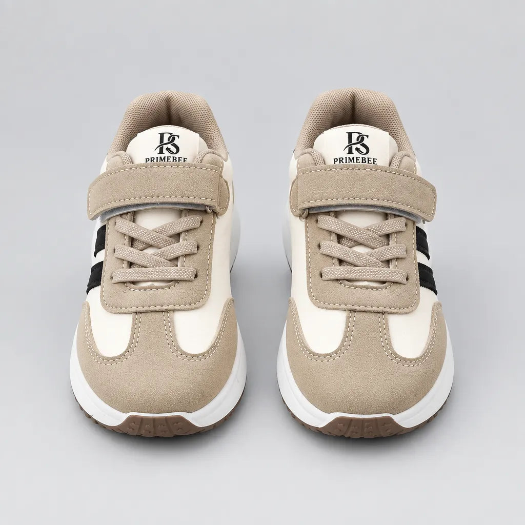 Front view of a pair of PrimeBee kids sneakers with black stripes and hook-and-loop strap