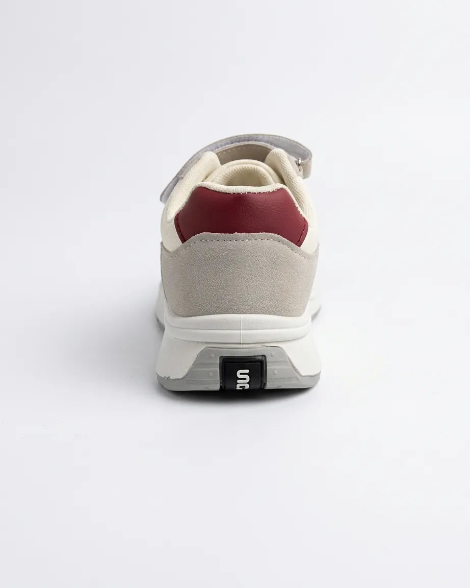 Front view of Prime Step kids' grey and cream sneakers with burgundy stripes and hook-and-loop straps