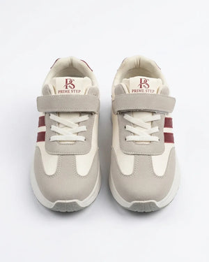 Side view of grey and cream Prime Step kids' sneaker with burgundy stripes and a hook-and-loop strap