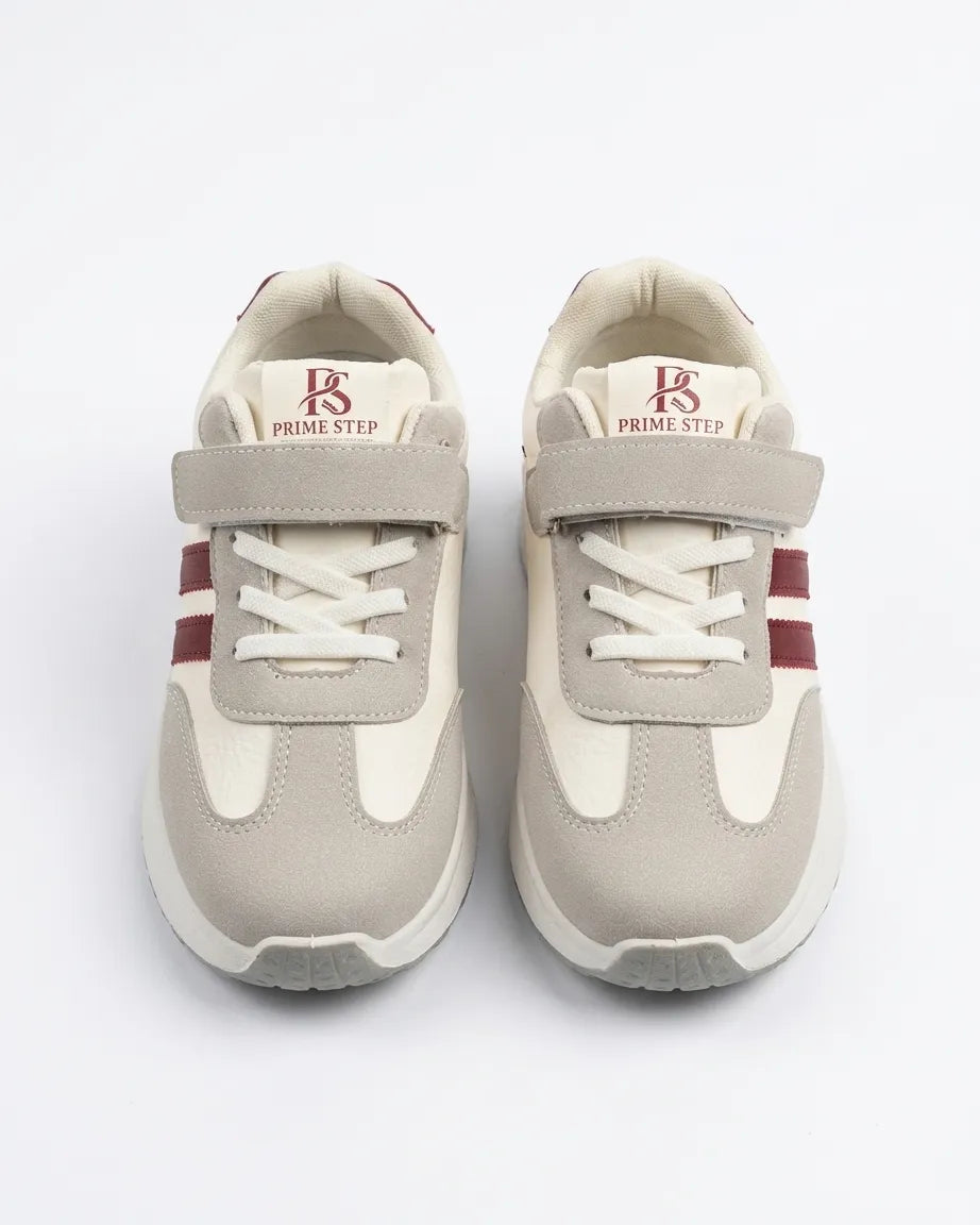 Side view of grey and cream Prime Step kids' sneaker with burgundy stripes and a hook-and-loop strap