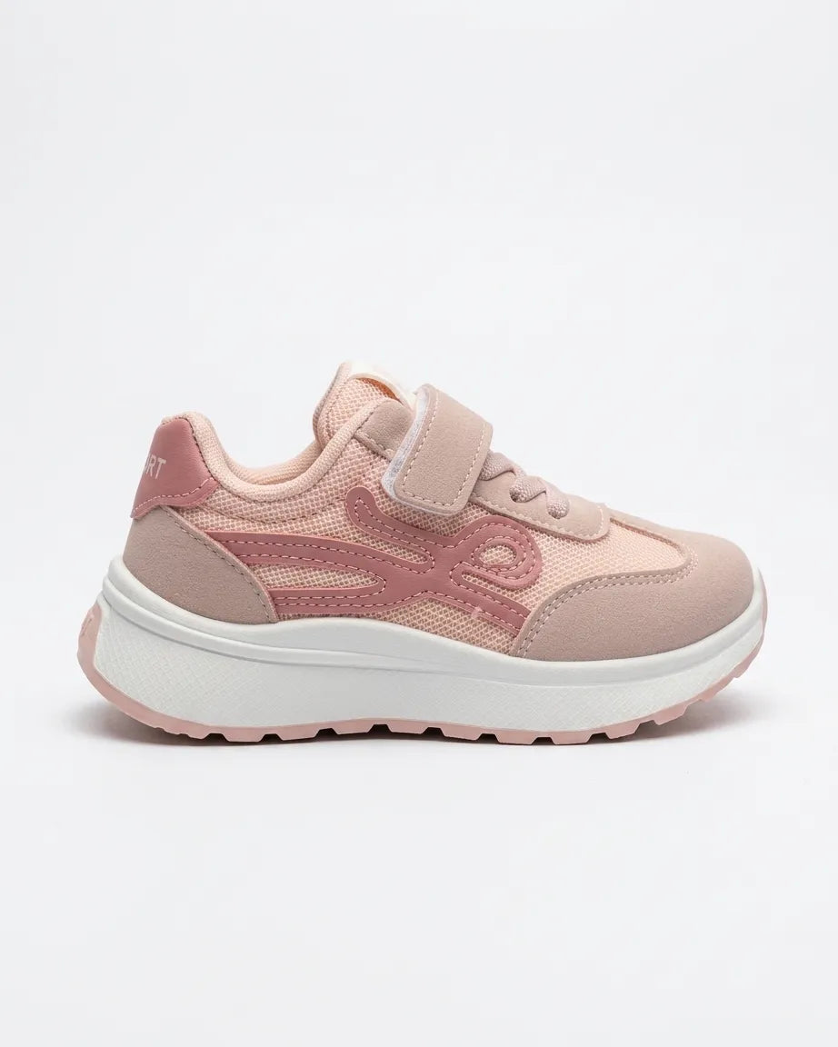 Pink girls' sneaker side profile showing mesh-look panels and pink tread