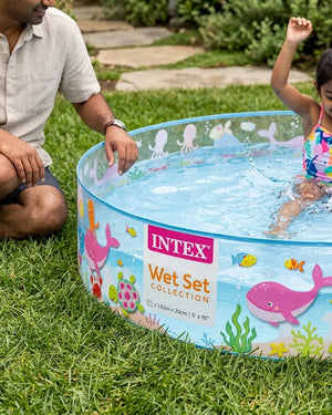 Kids inflatable pool, 5 ft wide with blue water and colorful sea animal print