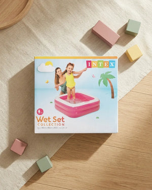 INTEX Wet Set inflatable kids pool box on floor with pastel blocks around it
