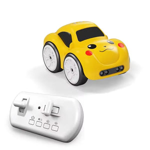 Yellow line-follow toy car with smiling face and white remote control
