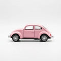 Volkswagen Beetle diecast model car toy, light pink side view with wheels and chrome