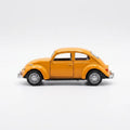 Volkswagen Beetle diecast model car toy, yellow-orange, side profile with chrome details