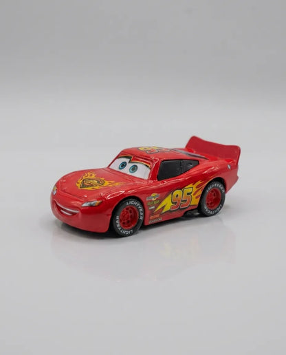 Red diecast pull-back car with friendly face and #95 front hood graphic