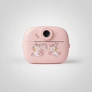 Pink kids instant print camera with unicorn and rainbow decoration on the front