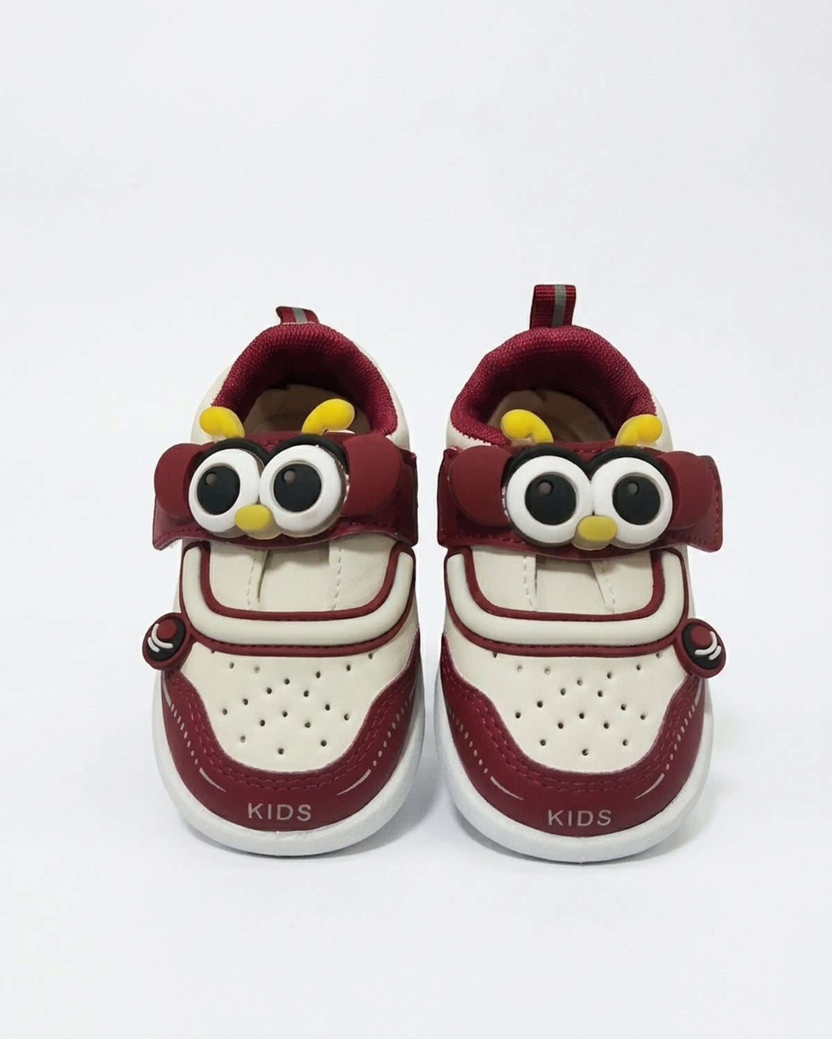 Maroon and cream owl cartoon kids shoes with strap-style detail, top view