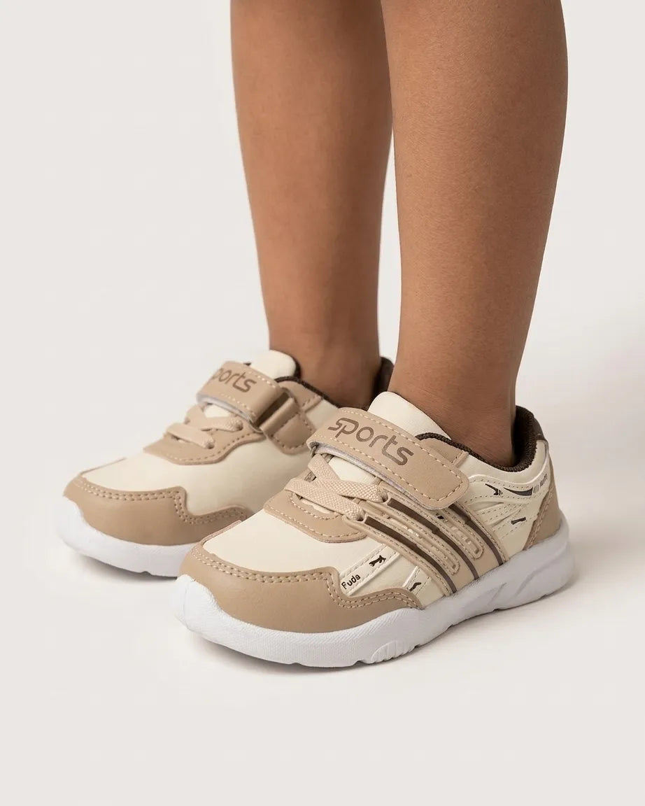 Black kids sports sneakers with white outsole and hook-and-loop strap