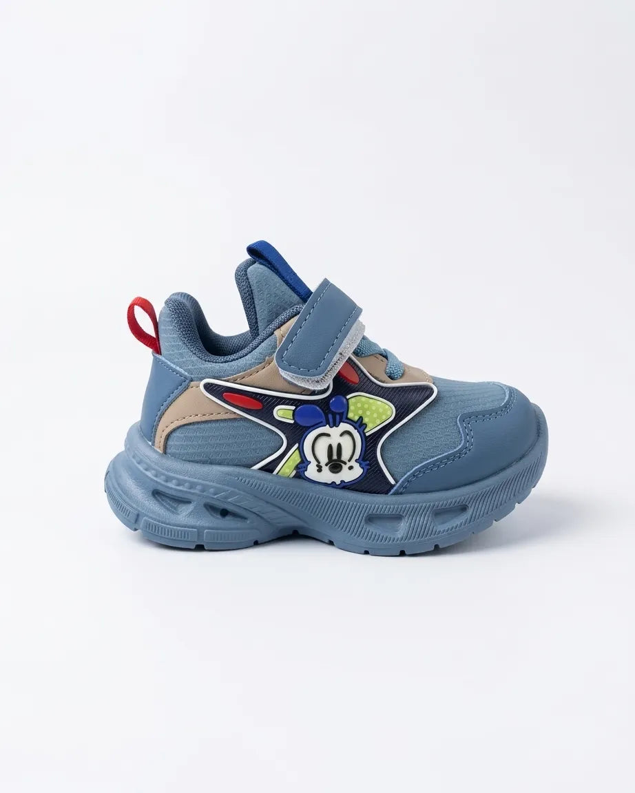 Grey kids cartoon chunky sneakers with orange pull tabs worn on feet