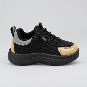 Rear view of black Trail kids sneaker with tan heel panel and striped pull tab