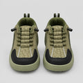 Pair of green Trail kids sneakers showing lace detailing and contrast toe panels