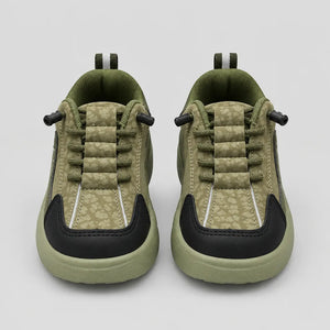Pair of green Trail kids sneakers showing lace detailing and contrast toe panels