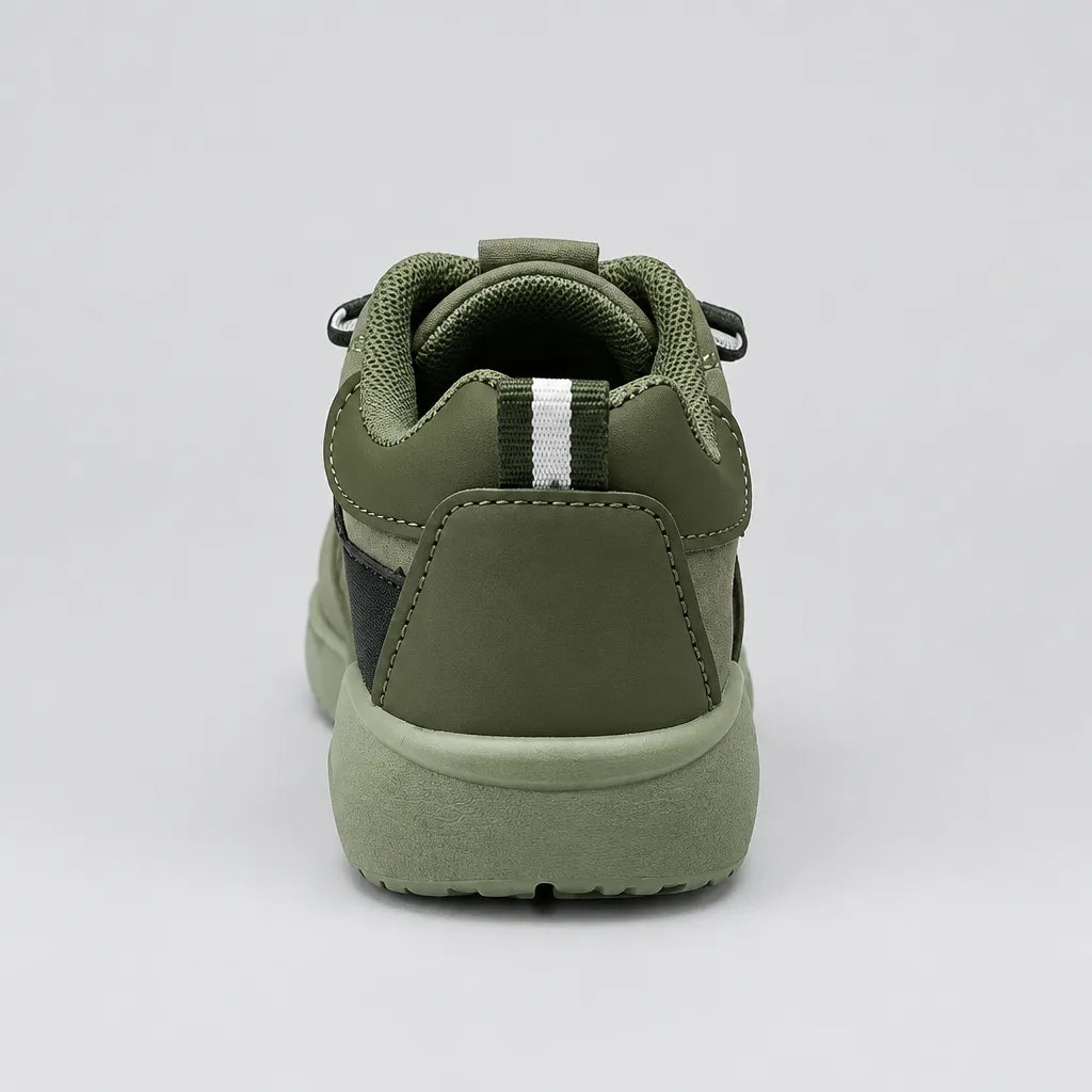 Rear view of green Trail kids sneaker with heel pull tab